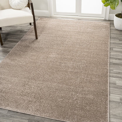 JONATHAN Y Tumbling Solid Low-Pile Area Rug