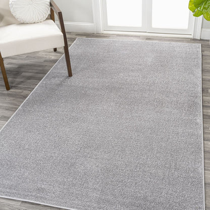 JONATHAN Y Tumbling Solid Low-Pile Area Rug