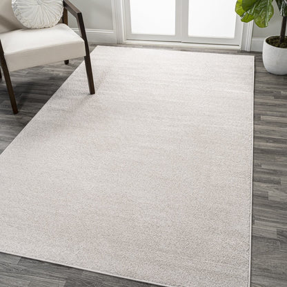 JONATHAN Y Tumbling Solid Low-Pile Area Rug