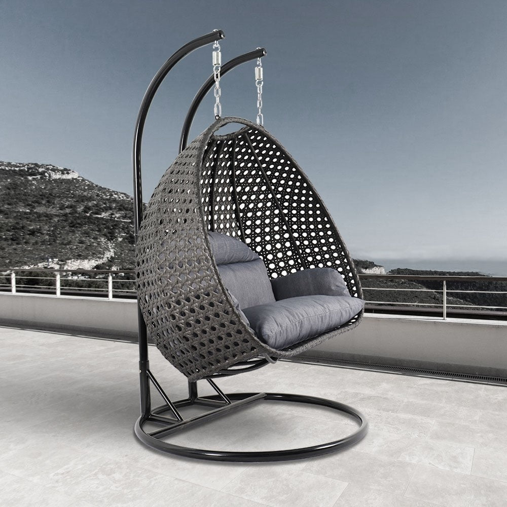 LeisureMod 2 Person Hanging Egg Chair with Stand - Outdoor/Indoor Rattan Wicker Patio Swing Hammock Lounger with Cushions