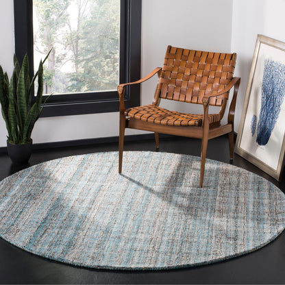 SAFAVIEH Handmade Abstract Coraly Modern Viscose Rug
