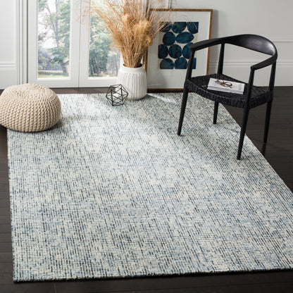 SAFAVIEH Handmade Abstract Lotje Modern Wool Rug