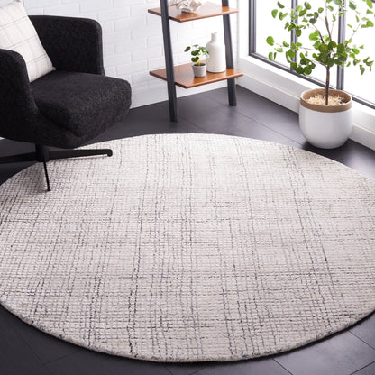SAFAVIEH Handmade Abstract Marikka Modern Viscose Rug