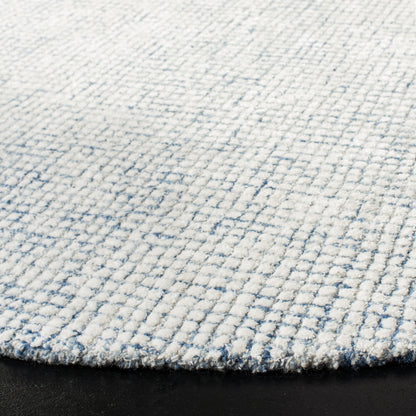 SAFAVIEH Handmade Abstract Marikka Modern Viscose Rug