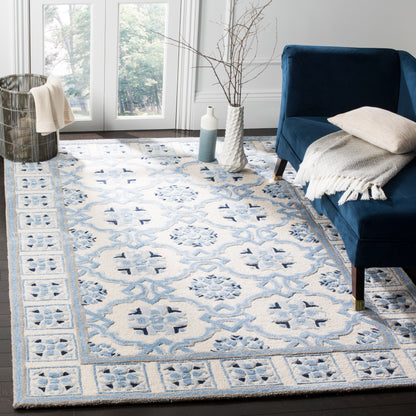 SAFAVIEH Handmade Bella Rodica Modern Floral Wool Rug
